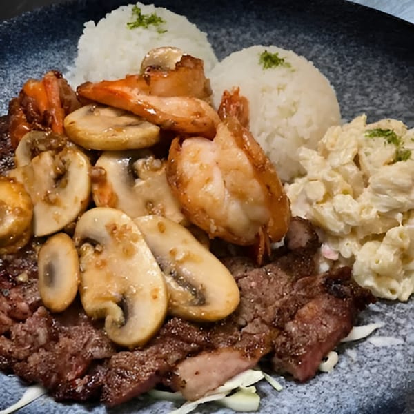 Momoyama Ramen & Hawaiian BBQ plate with grilled meat, shrimp, mushrooms, rice, and macaroni salad.