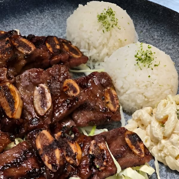 Momoyama Ramen & Hawaiian BBQ's kalbi short ribs, two scoops of rice, and macaroni salad.